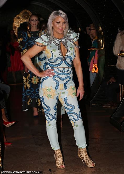 brynne edelsten 36 slips into very busty jumpsuit for melbourne spring fashion week daily