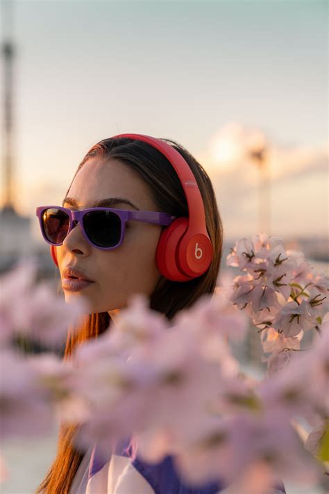 Girl In Pink Sunglasses Holding White Flowers Photo Free Image On