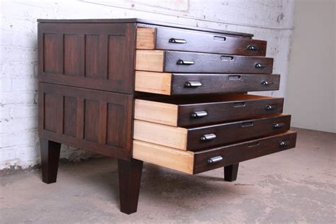 While these blueprint filing cabinets are not the traditional flat file type of cabinet, they offer mobility and a size that allows you to locate the drawings closer to your workstation. Vintage Dark Oak Blueprint Flat File at 1stDibs