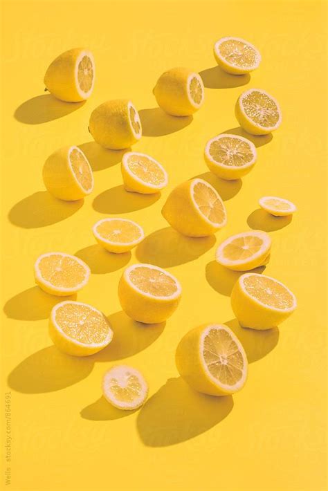 Yellow Lemons On A Yellow Background By Studio Marmellata Lemon