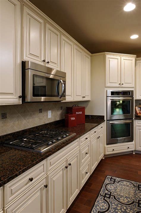 Official guide to granite countertops colors, types, buying granite, prices, patterns, sealing, cleaning, cost of installation and hiring the best fabricator. contemporary kitchen white kitchen cabinets baltic brown ...