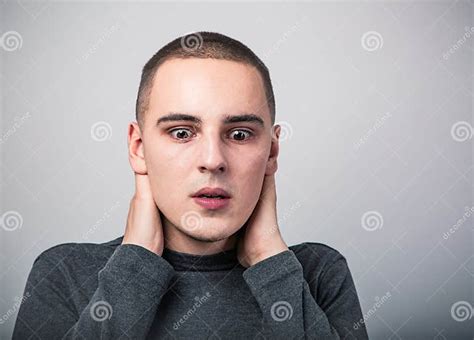 Shocked Crying Man With Dropping Tears On The Face With Headache