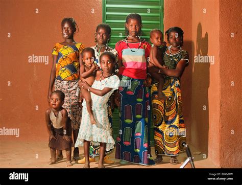 Young Women And Children Line Up For A Nighttime Photo In Djibo In