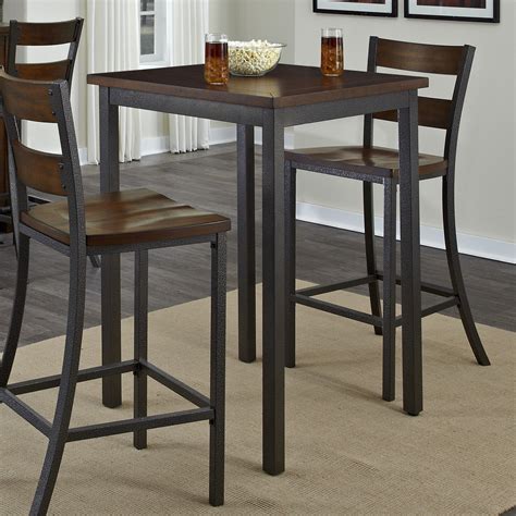 The Cabin Creek Bistro Table By Home Styles With Hardwood Solids And Veneers In A Heavily Distressed Multi Step And Chestnut Finishing 2 