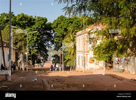 bolama island guinea bissau may 6 2017 unidentified local people walk along the street in
