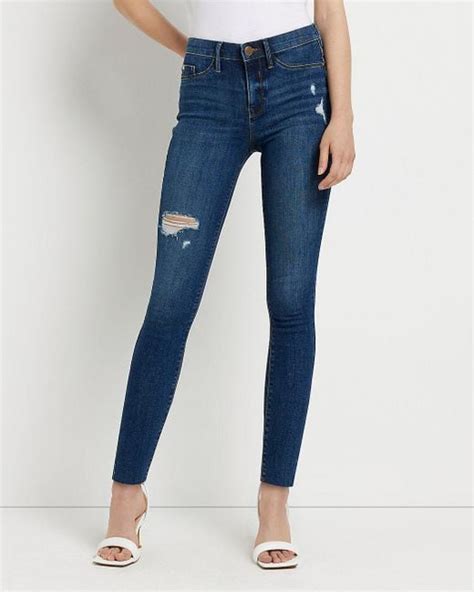 River Island Denim Blue Ripped Molly Mid Rise Skinny Jeans Lyst Canada