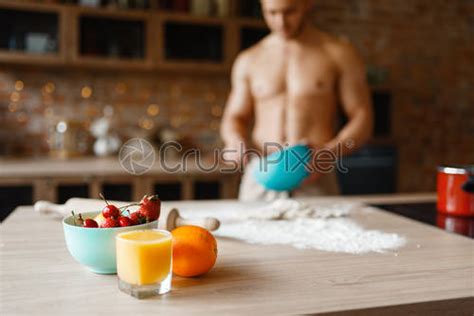 Nude Man Cooking Pastry On The Kitchen Stock Photo Crushpixel