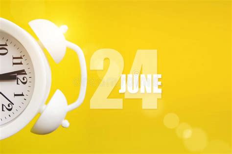 June 24th Day 24 Of Month Calendar Date White Alarm Clock On Yellow