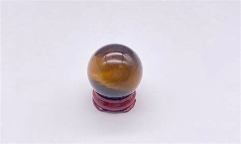 Tiger Eye Sphere A Time For Karma