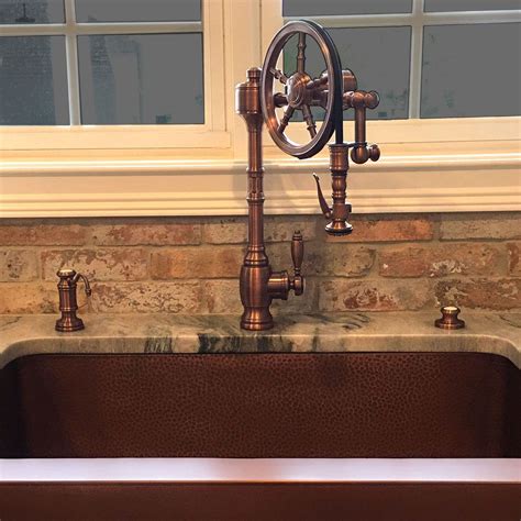 We only offer kitchen faucets in rustic finishes such as oil rubbed bronze, antique copper and antique brass since other finishes look out of place when used with most copper sinks. Waterstone Wheel Faucet in antique copper. Goes great with ...