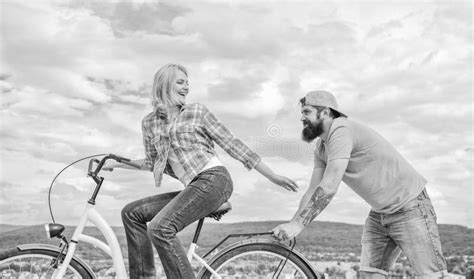 Man Pushes Girl Ride Bike Girl Cycling While Man Support Her Support Helps Believe In Yourself
