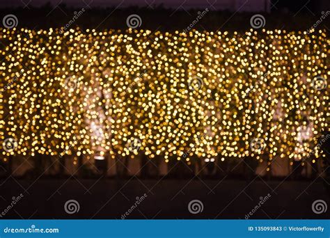 Glittering Glowing And Sparkling Defocused Blinking Warm Gold Light