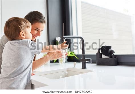 Mother Helps Child Wash Hands Soap Stock Photo 1847302252 Shutterstock
