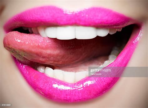 Tongue Licking Pink Lips Photo Getty Images
