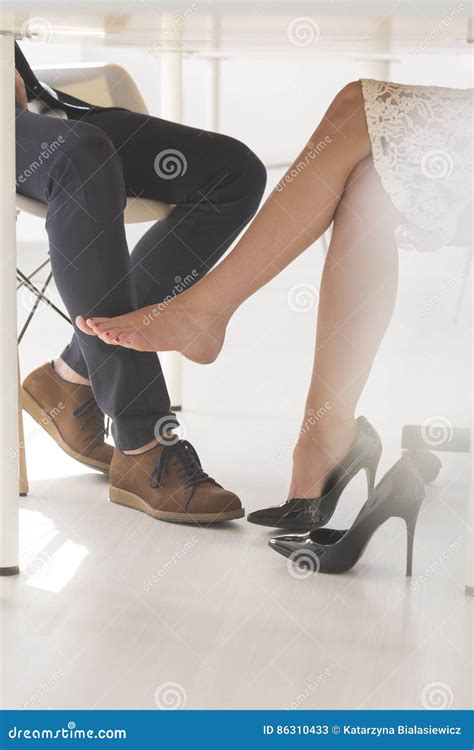 Woman Seductively Touching Man With Her Leg Stock Image Image Of Businessman Sensual 86310433