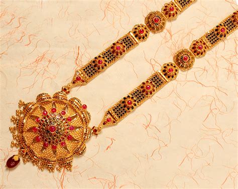 This article helps you understand why a simple black beaded also, explore some of the latest mangalsutra designs! PNG