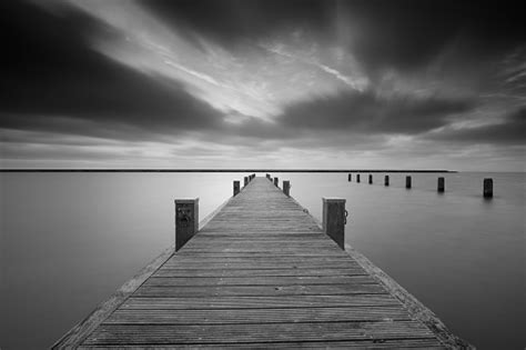 Paid images are available for commercial use. Photo libre de droit de Jetty At Lake Markermeer In Black ...