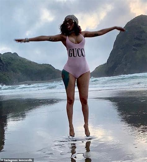 Cardi B Shows Off Her Cleavage In A Hot Sexy Bikini Outfit In New Photos