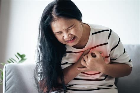 Premium Photo Closeup Of Asian Woman Having Heart Attack Woman