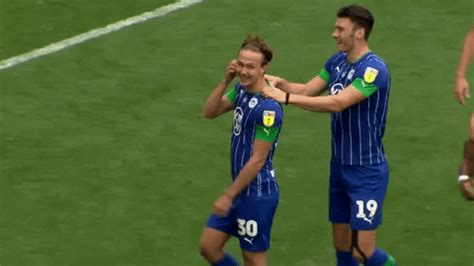 Kieffer moore (wigan athletic) right footed shot from the centre of the box to the bottom left corner. Kieffer Moore Hug GIF by Wigan Athletic - Find & Share on ...