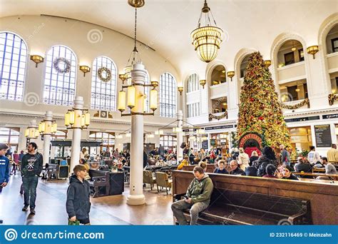 People Relax And Wait For Train Inside Of Historic Union Station In