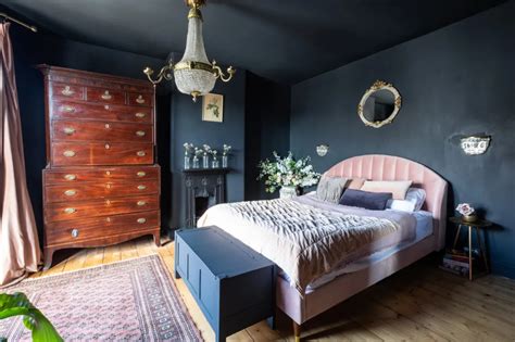 Bedroom With Dark Blue Painted Ceiling And Walls
