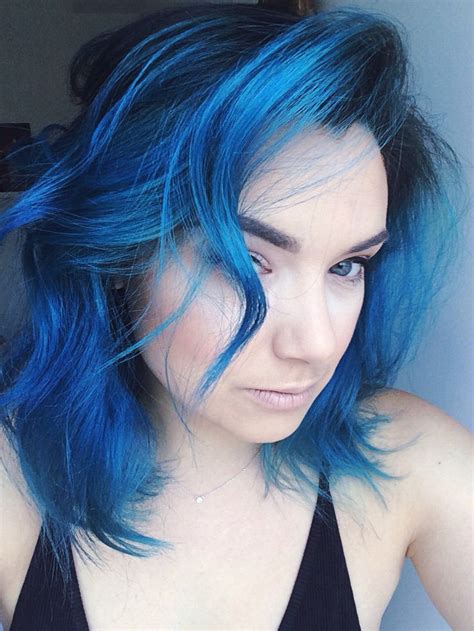 Dark blue hair color looks bold and vibrant against every skin tone. Beautiful electric blue pravana color with dark roots ...