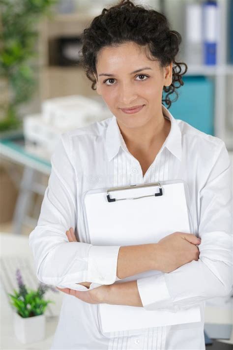 Happy Smiling Young Beautiful Business Woman With Clipboard Stock Image