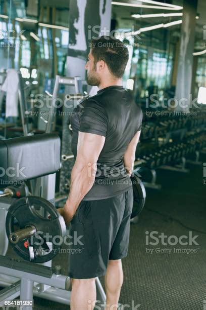 Handsome Muscular Male Model With Perfect Body Doing Exercise Stock
