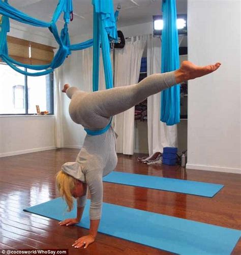 Coco Hangs Upside Down During Aerial Yoga Daily Mail Online