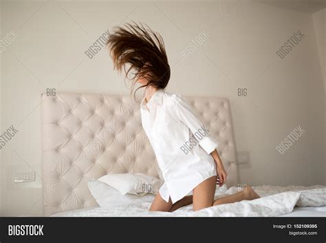 beautiful woman posing bedroom bed image and photo bigstock