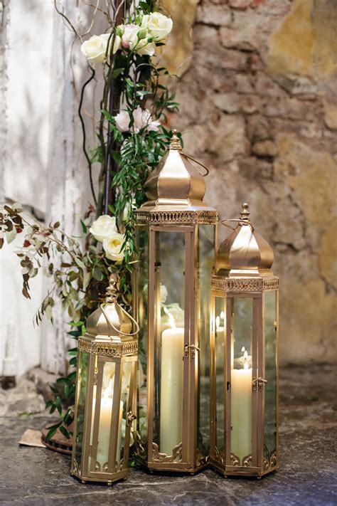 Pillar Candles In Lanterns Elizabeth Anne Designs The Wedding Blog