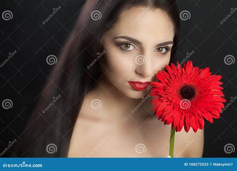 Beauty Woman Face Closeup Of A Beautiful Young Female Model With Soft Smooth Skin And