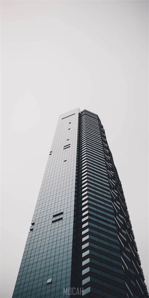 282406 A Tall Skyscraper With A Black Glass Facade Black Facade