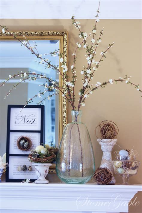 The classy cherry blossoms with the funky disco ball combination looks amazing on your mantel for spring. SPRING MANTLE - StoneGable