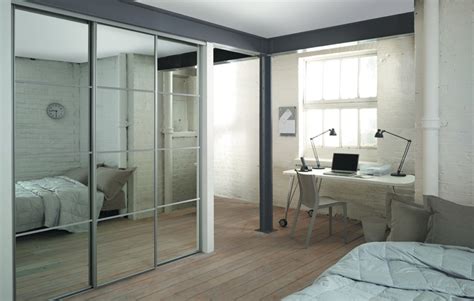 Grey sliding wardrobe doors are a popular choice that will match any interior; 4 SLIDING MIRROR DOORS AND TRACK SET