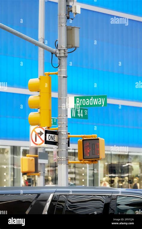 Broadway Road Sign And Traffic Light At The Times Square New York City