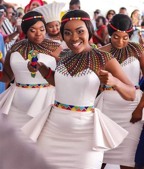 A ndebele man wearing his traditional attire faces humiliation in the shop for inappropriate dressing. Ndebele traditional bridesmaid dresses, Wedding dress | White Kitenge Dresses | African Dress ...