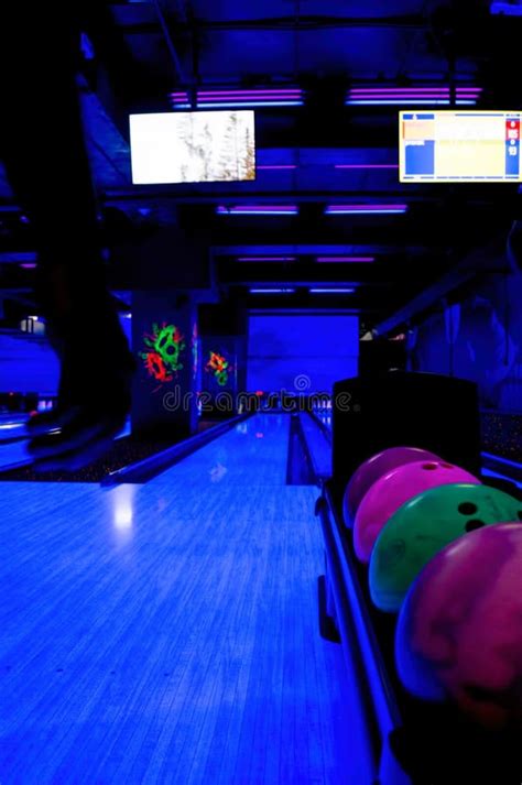 Bowling Alley Lit By Blacklight With Neon Colors Stock Photo Image Of