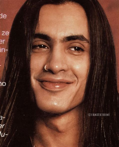 A Close Up Of A Person With Long Hair And A Smile On The Cover Of A
