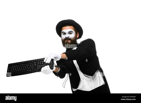 Angry Mime As A Businessman Is Destroying Keyboard Stock Photo Alamy