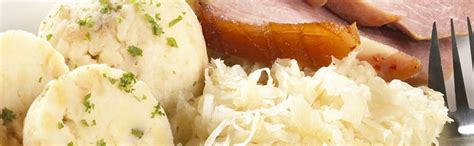 Pork Roast With Crackling With Sauerkraut And Bread Dumplings Kühne