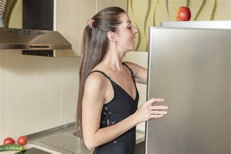 Woman Looks Into The Fridge Stock Image Image Of Housewife Freezer