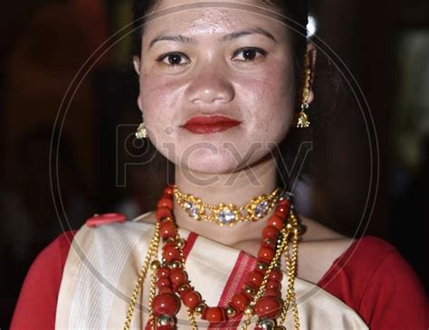 Image Of Assamese Woman In Traditional Assam Clothes During Bihu Festival Celebrations In