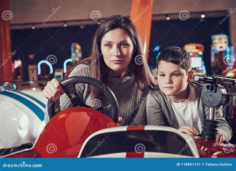 Concentrated Mother And Son Driving Toy Car Stock Image Image Of Cute