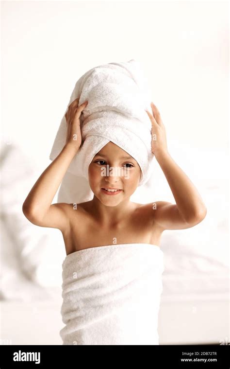 Cute Girl Wearing A Bathrobe With Wet Hair After Bath Or Shower Laughing And Smiling Little