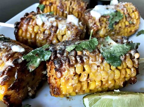 Without a grill, katie improvised and roasted the corn in the oven to achieve similar results, then slathered the cob with creamy, spicy mayo and topped it with cotija cheese and cilantro. Chili's Mexican Street Corn Recipe - Mexican Street Corn Salad - Rinse corn under water ...