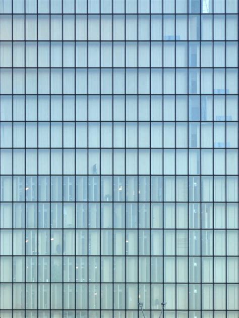 Glass Building Facade With Green Texture