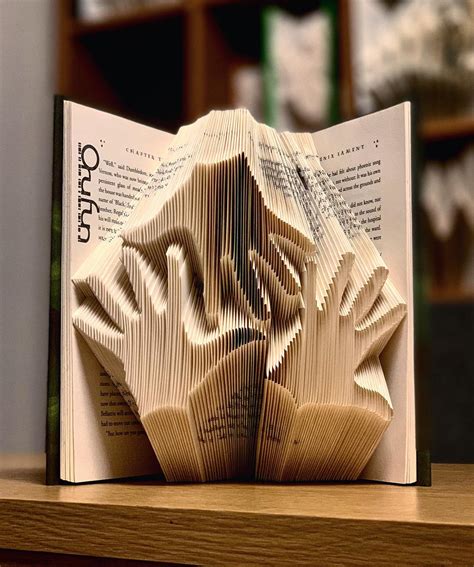 Artist Creates Different Art Pieces from Folded Books - MobiSpirit