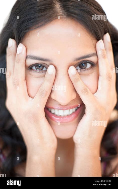 Model Released Portrait Of A Woman With Her Hands Touching Her Face